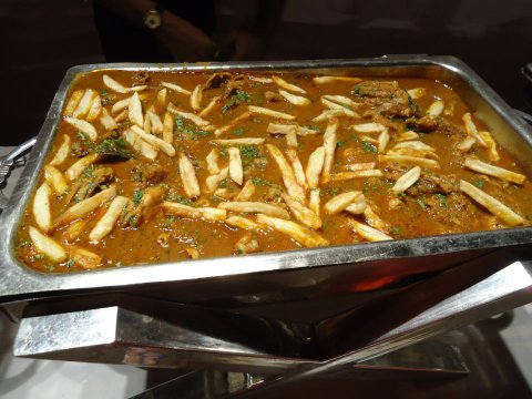 Masala chicken with chips - an old Parsi classic